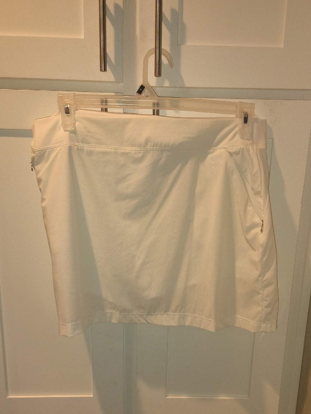 Calvin Klein Cream Athletic Skort with Zip Pockets